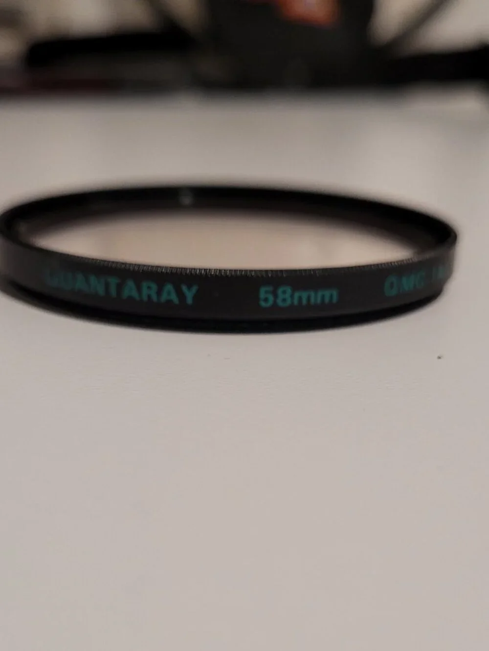 Quantaray 58mm OMC Multi-Coated camera lens filter skylight correction